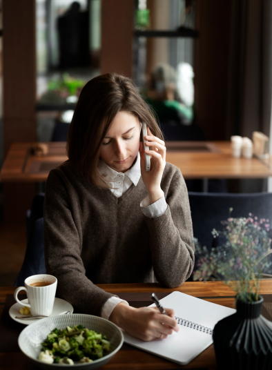 high-angle-woman-talking-phone 1